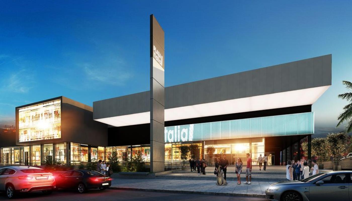 fachada del centro comercial moderna urbana de gran escala, foto en la tardecita plaza muy iluminada